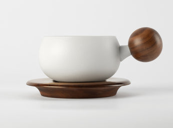 Elegant O2H TEA ceramic cup with artisan wooden handle, a modern twist on traditional tea cup, perfect for your tea ritual