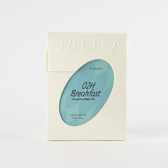 A package of O2H Breakfast Tea featuring Osmanthus Black Tea, with a sophisticated design and a peek window revealing product name O2H breakfast