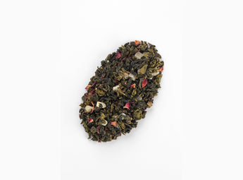 Close-up of White Peach Oolong Tea leaves mixed with dried peach fragments,